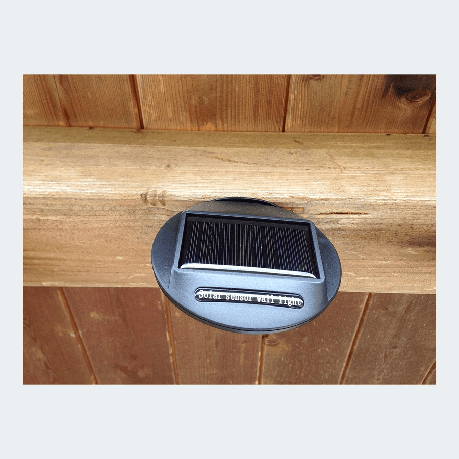 Compact wall-mounted solar LED floodlight
